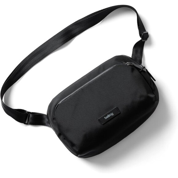 Transit Sling 5L black travel crossbody bag with internal organization and weath